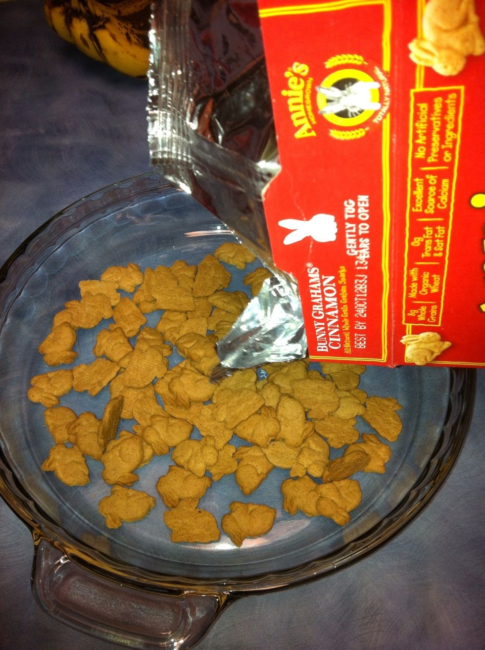 Add bunnies to the pie dish. Make sure there's plenty covering the whole dish and they are layering on top.