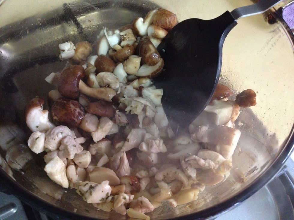 Add butter. Add garlic, onions to stir fry. Next, add chicken. Followed by mushrooms. I added some parsley and oregano flakes.