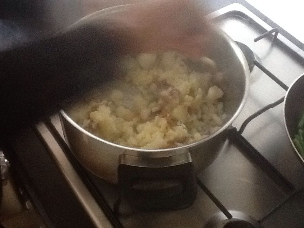 Add butter and mix until preferred texture.