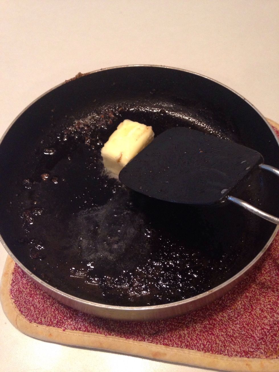 Add butter and swirl around pan until it melts.