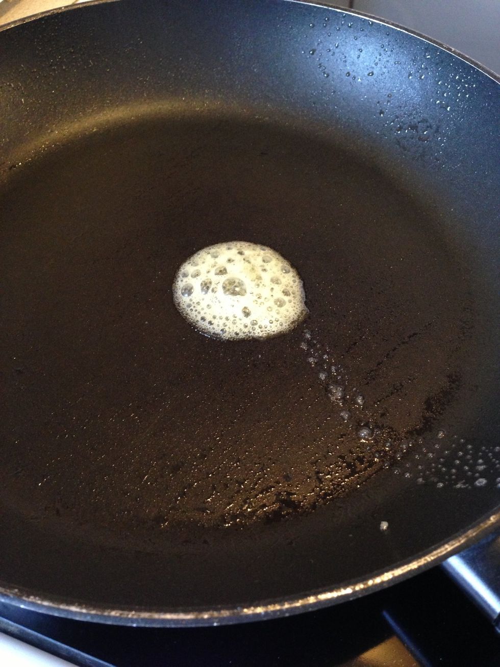 Add butter into the pan. When the butter looks like this and has turned quiet - the pan is ready