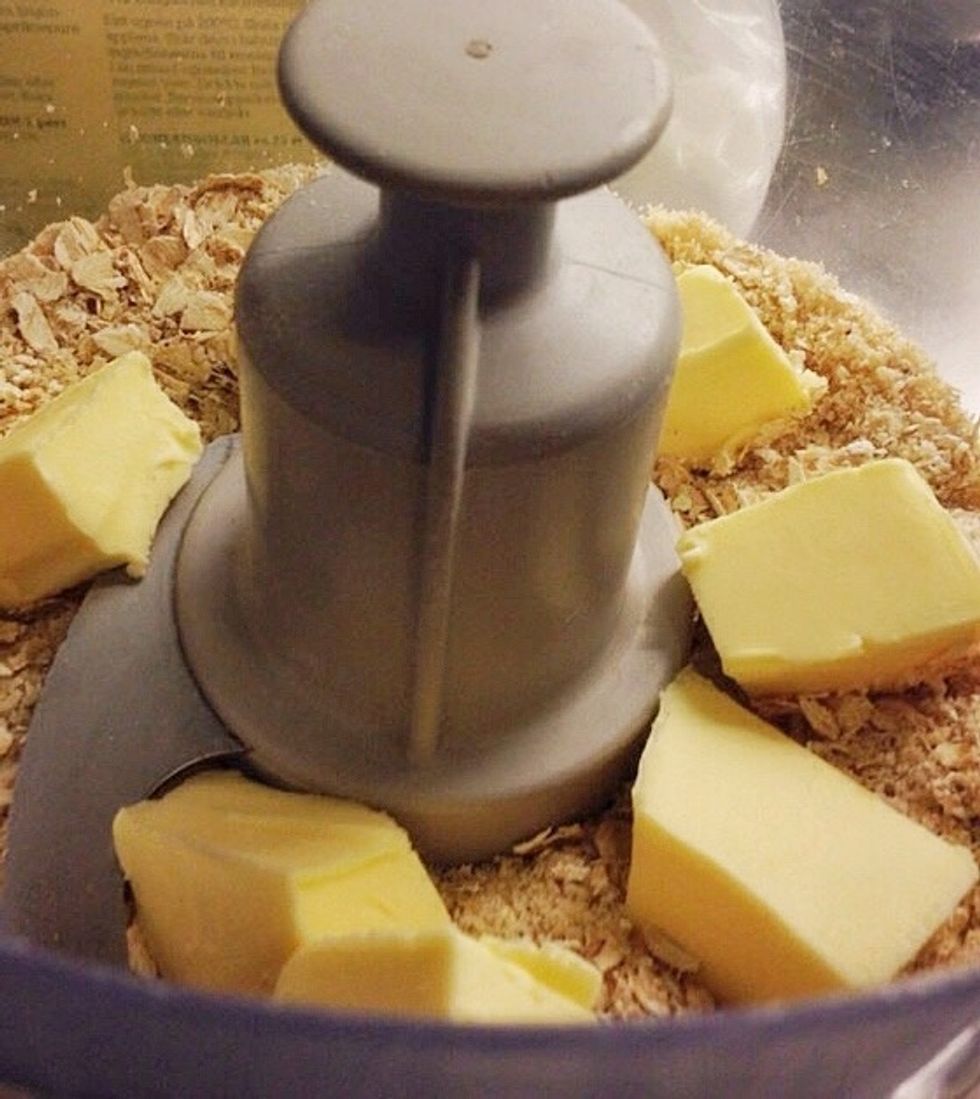 Add butter. Let the good processor do its magic or mix by hand.