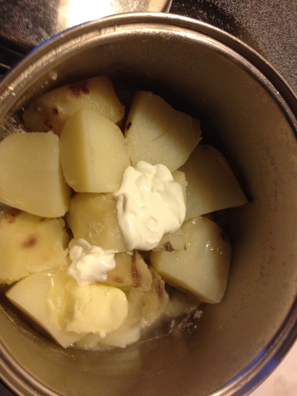 Add butter, salt and sour cream to your potatoes. You can add cheese too but I didn't have any : /