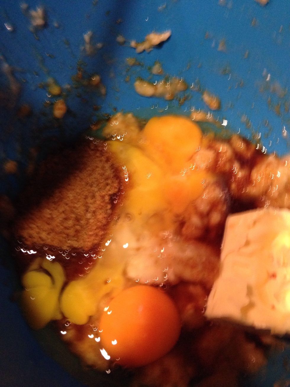 Add butter, sugar, and eggs in the bowl. Mix everything together.