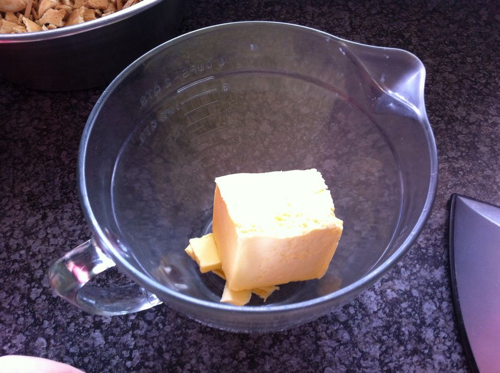 Add butter to a microwave proof bowl and microwave on high until melted.