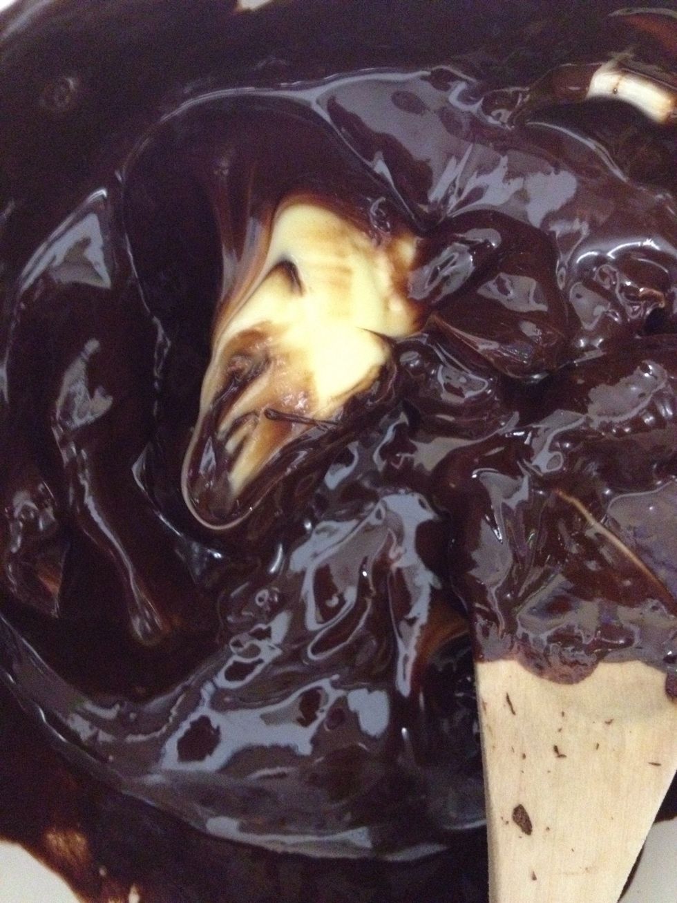 Add butter to chocolate while still hot to melt it in. Lazy, but time saving and washing up reducing!