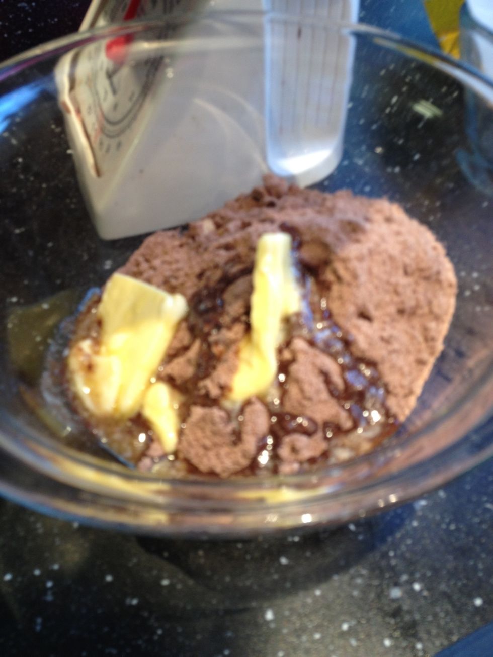 Add butter to mixture and add one table spoon of water