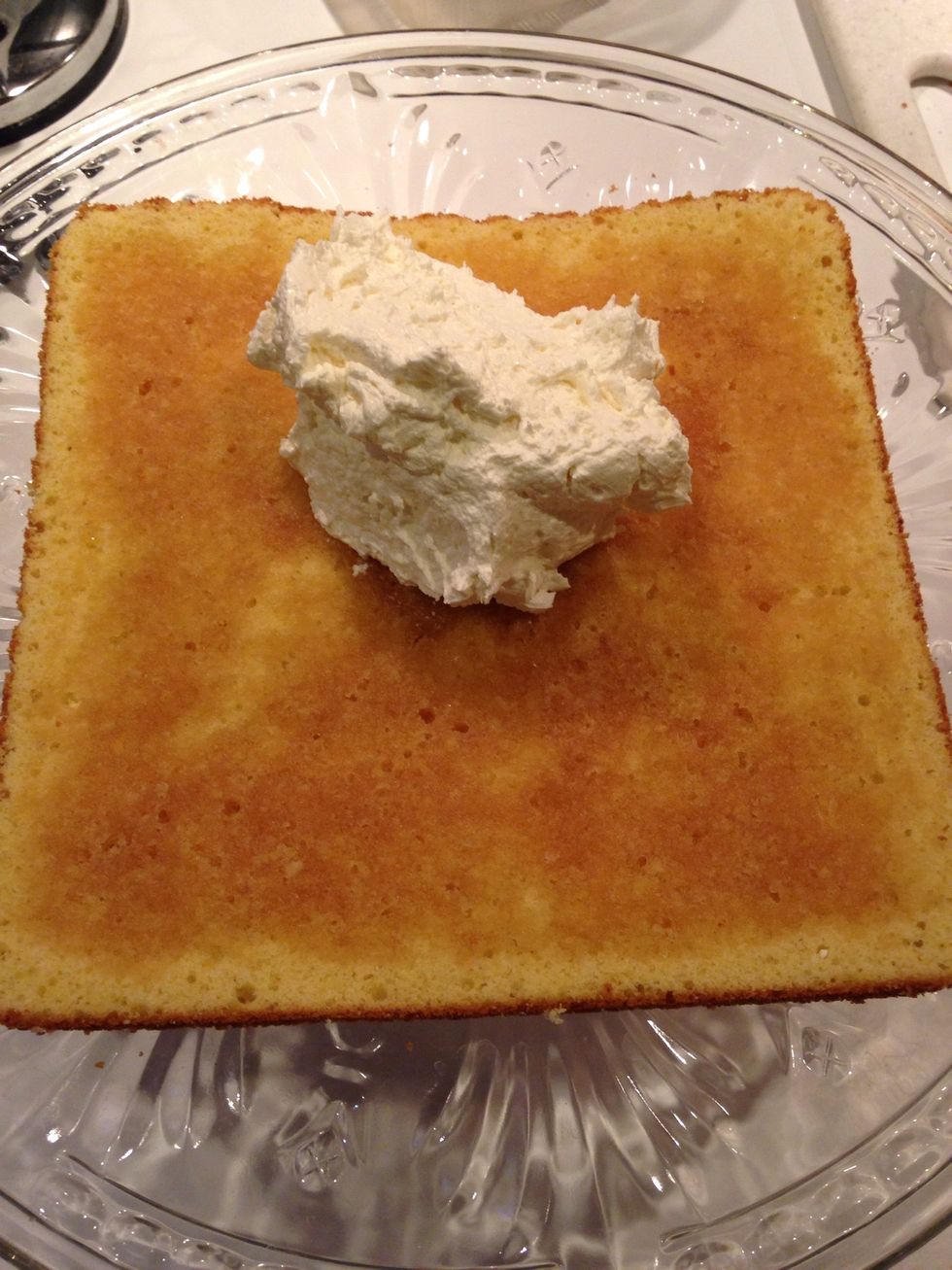 Add buttercream or other filling, I am using an Italian Meringue Buttercream here.