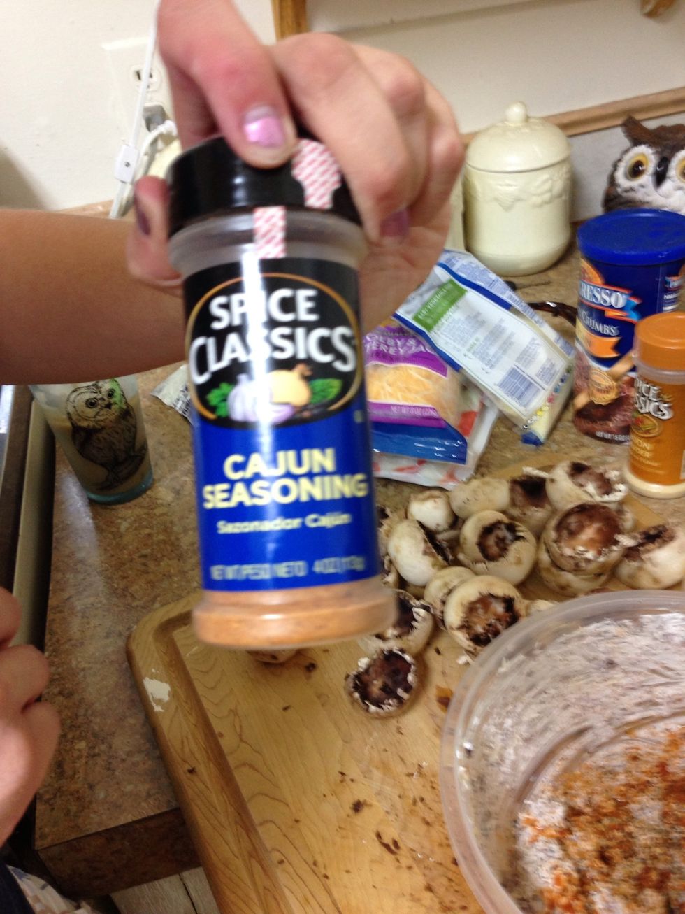 Add Cajun seasoning to bits and cream cheese mixture.