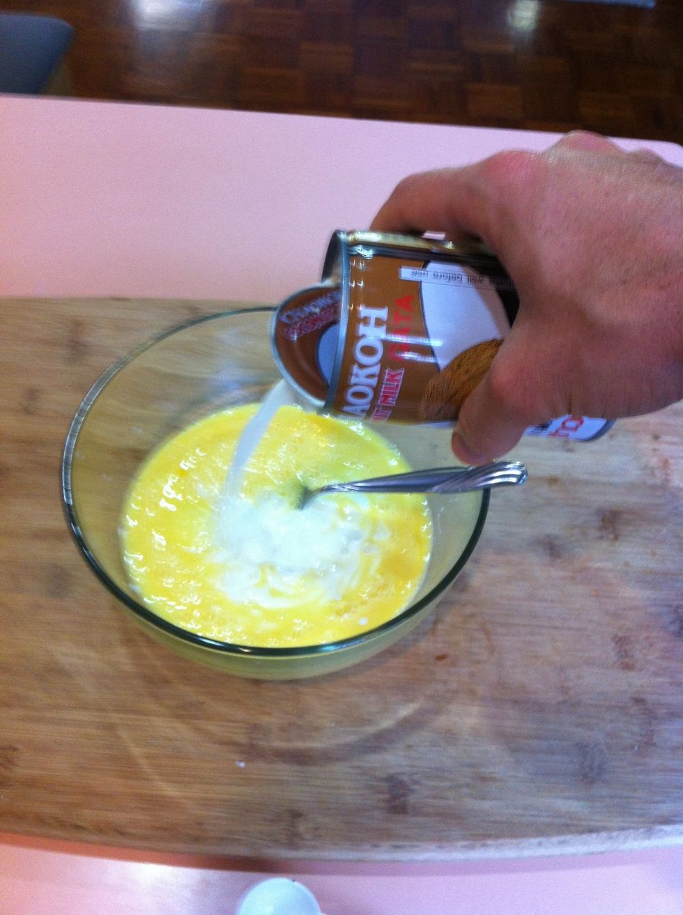 Add can of coconut milk and mix well.