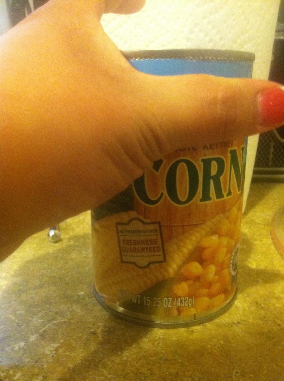 Add can of corn into pot.