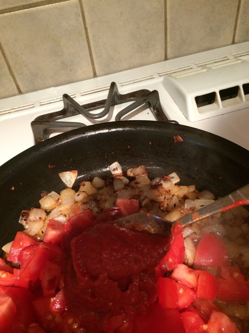 Add can of tomato paste and cook for another 5 mins