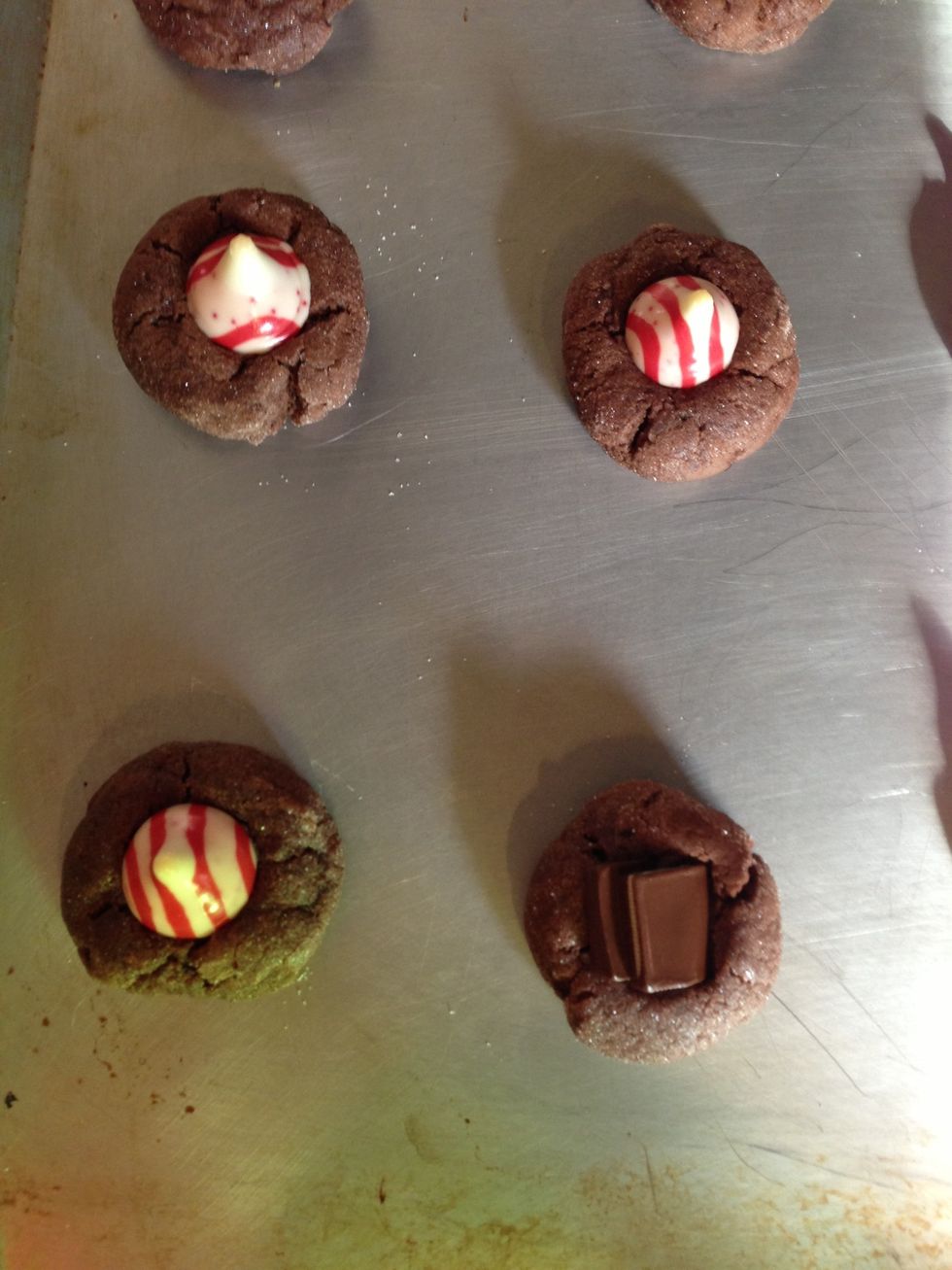 Add candy of your choice. I used candy cane Hershey kisses, Andes mints, and some mint chocolate chips. Bake for about 2 more minutes, don't burn candy!