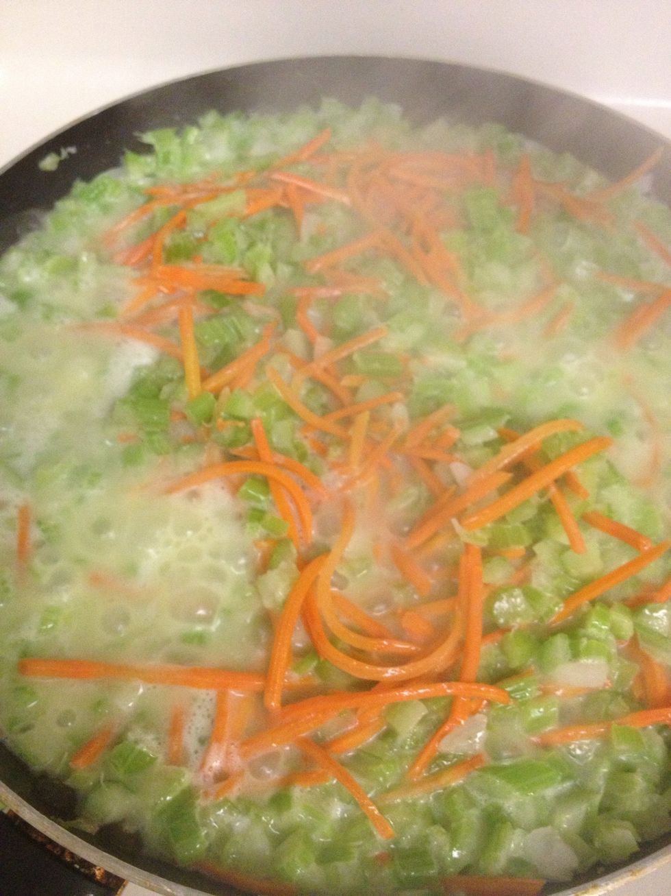 Add carrots saut\u00e9ed till tender.