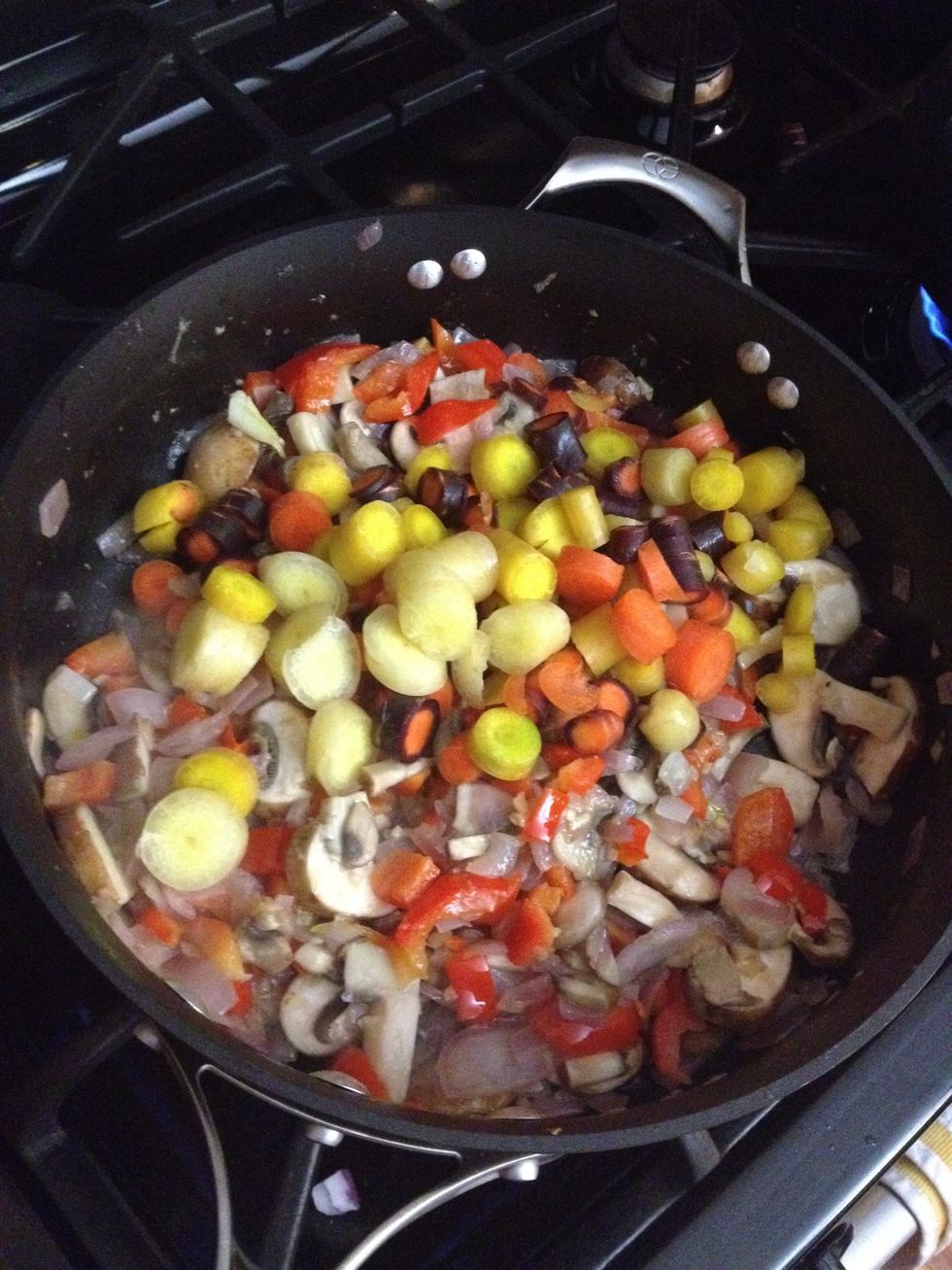 Add carrots then saut\u00e9 until carrots are slightly tender.