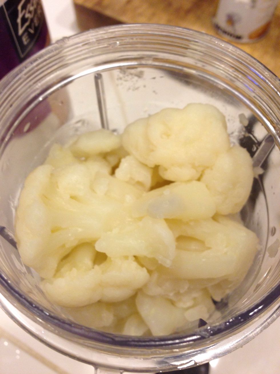 Add cauliflower to your blender.