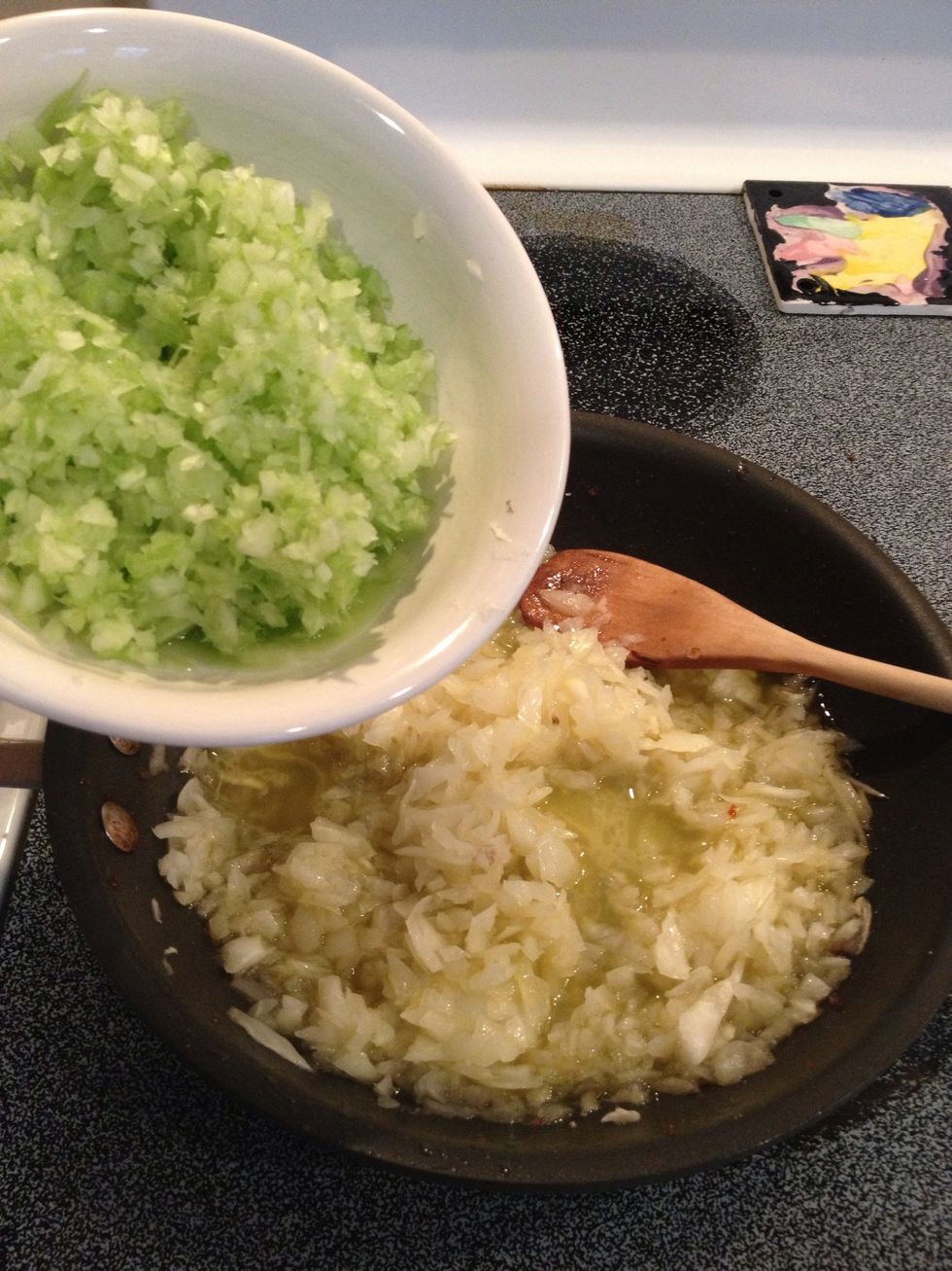 Add celery.  Stir and cook until softened.