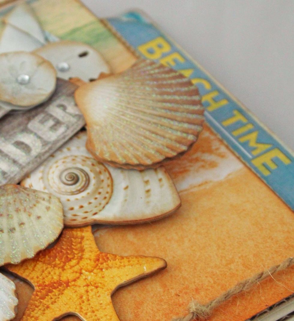 Add chalkboard stickers as tabs throughout the mini album.