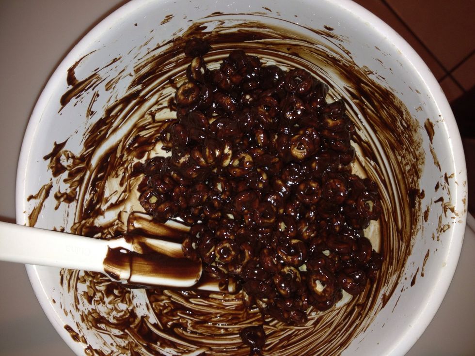 Add cheerios, mix.