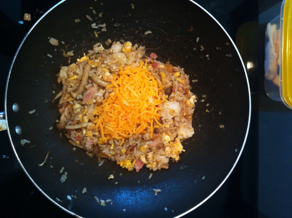 Add cheese I use cheddar here but normally I would use mozzarella for its gluey texture
