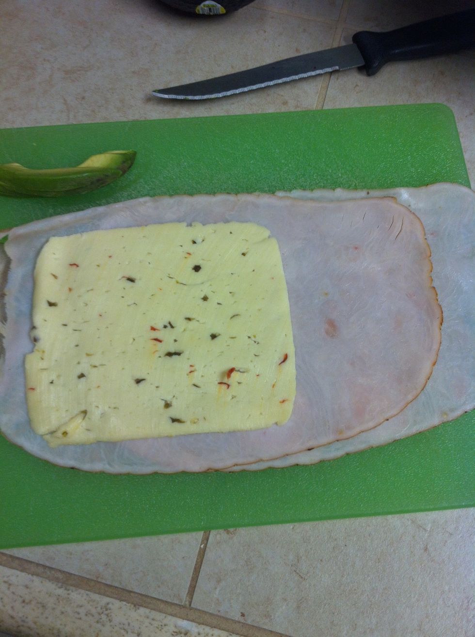 Add cheese if you like. I use Boar's head jalape\u00f1o havarti to add a spicy kick to the rolls!!