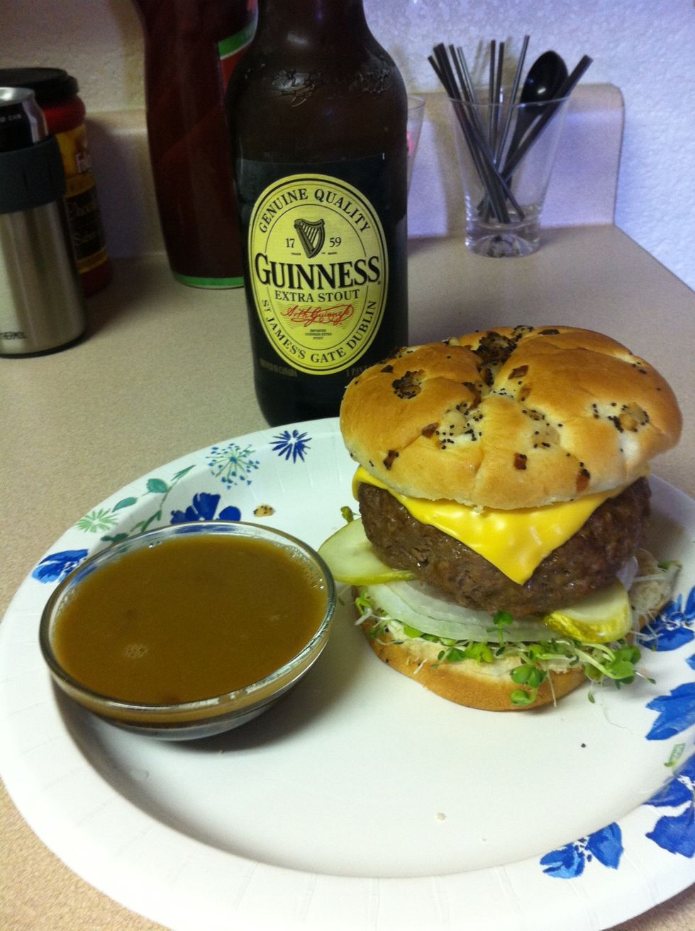Add cheese if you like, put together your burger and pour your Au jus into a dish. Use leftover beer to drink with your meal. Enjoy. I would recommend cutting the burger in half for easier dipping.