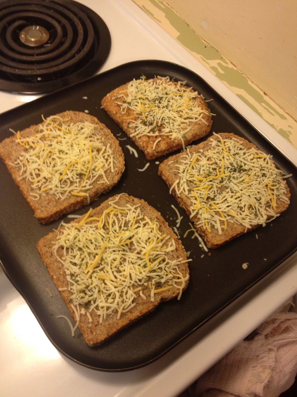 Add cheese mixture, but only a little because we will be adding more cheese