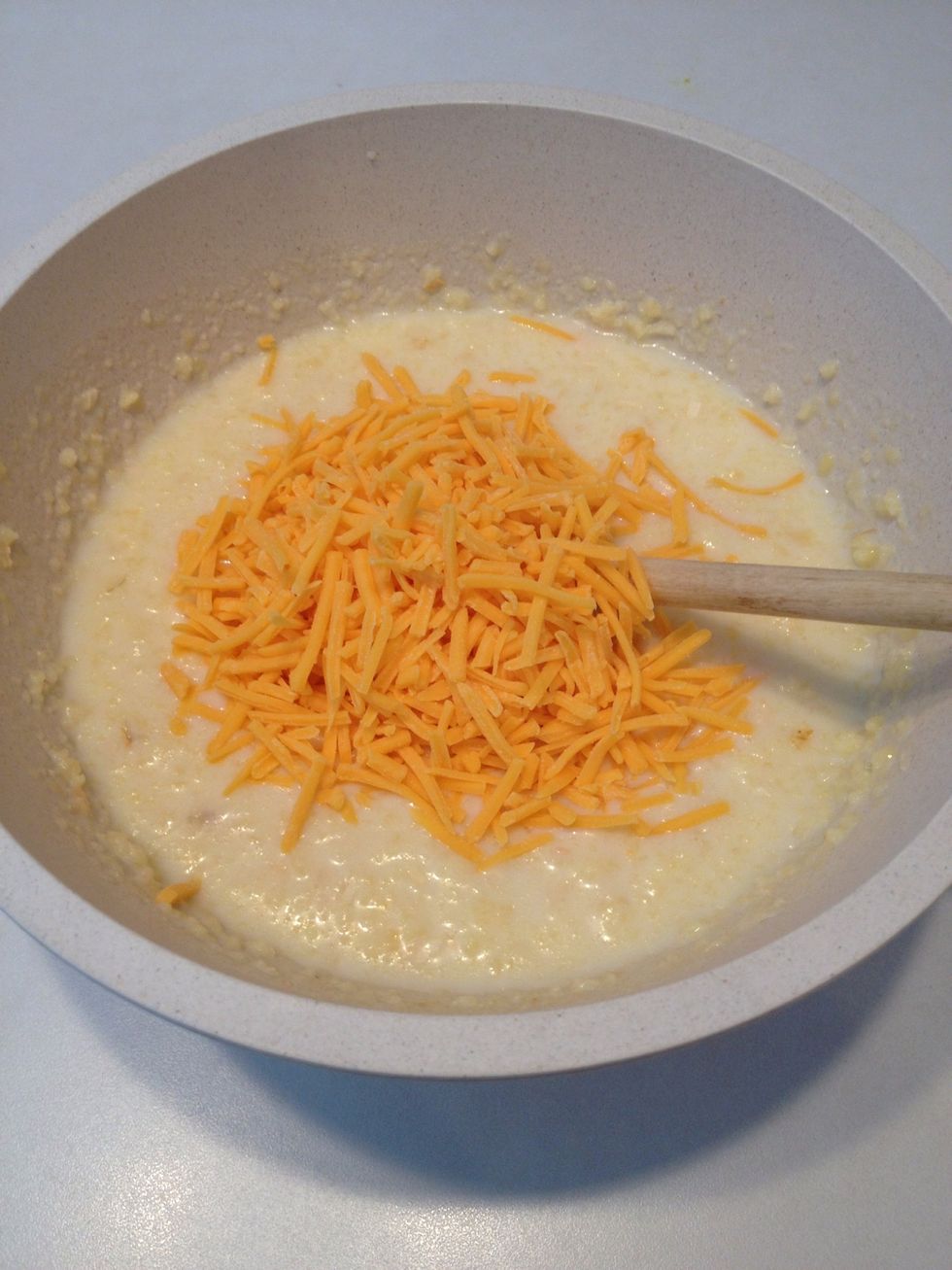 Add cheese. Stir.