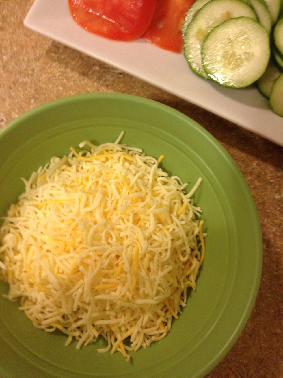 Add cheese to a bowl