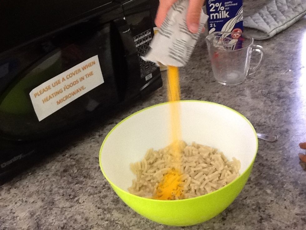 Add cheese to noodles