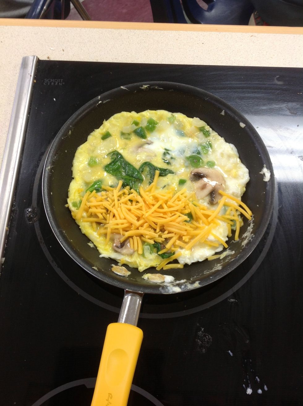 Add cheese to one side.