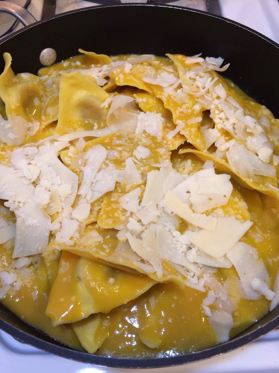Add cheese to the pan. You can add as much or as little of this too. I prefer a little extra cheese... ;) Stir until cheese melts into soup.