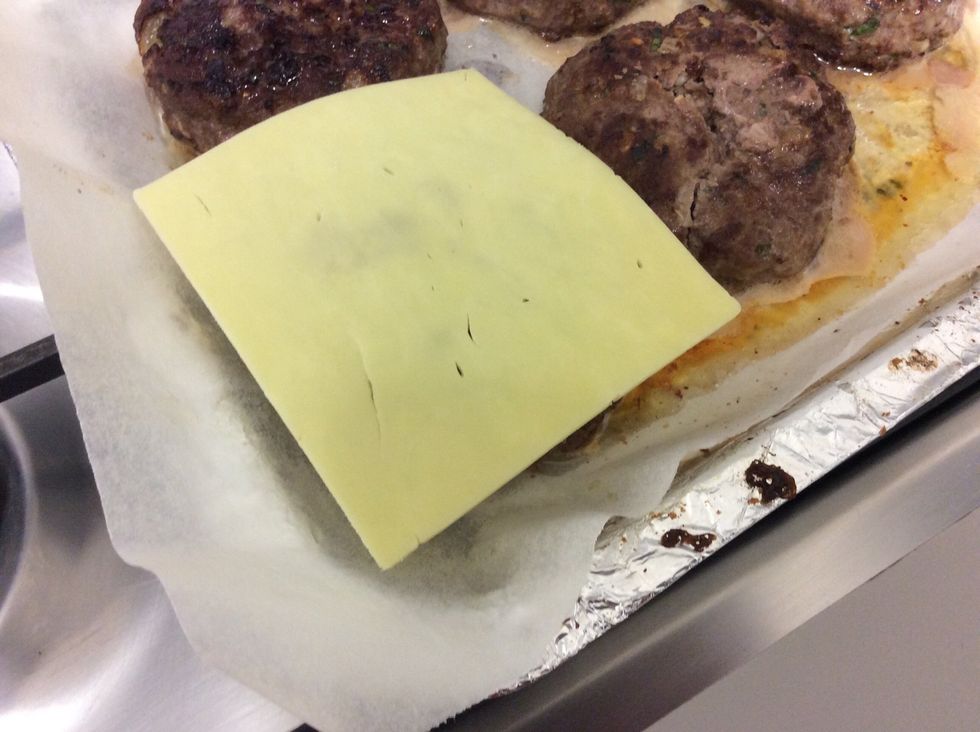 Add cheese to the patty straight after you take the patty out of the oven so that it will melt