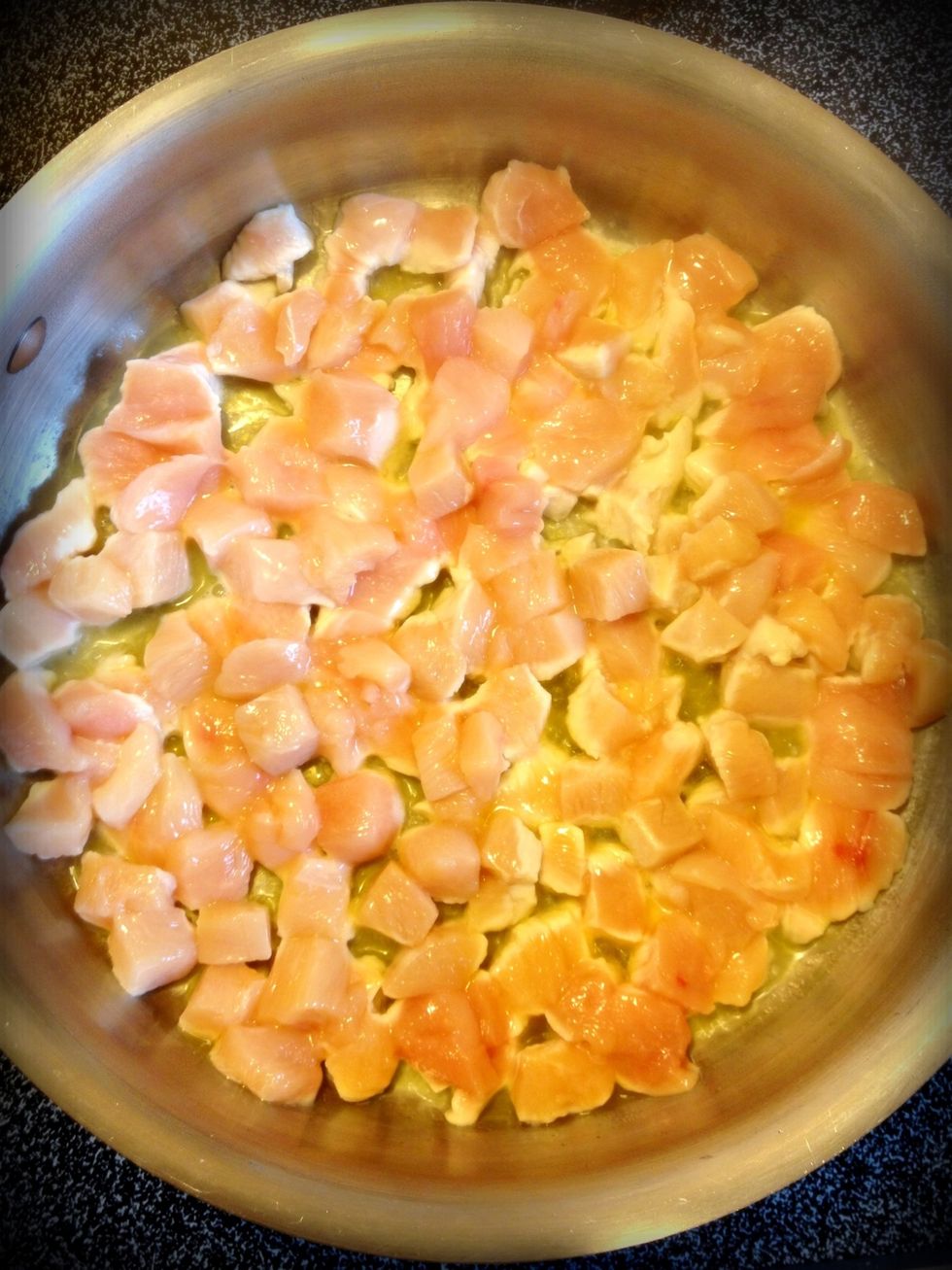 Add chicken and lightly brown.