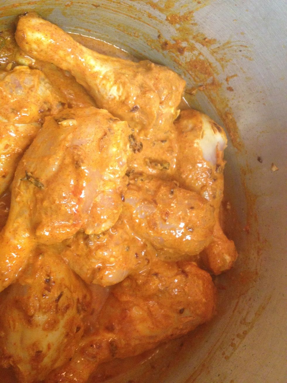 Add chicken and mix well. Add a cup of water cover with a lid and cook on a less than medium flame