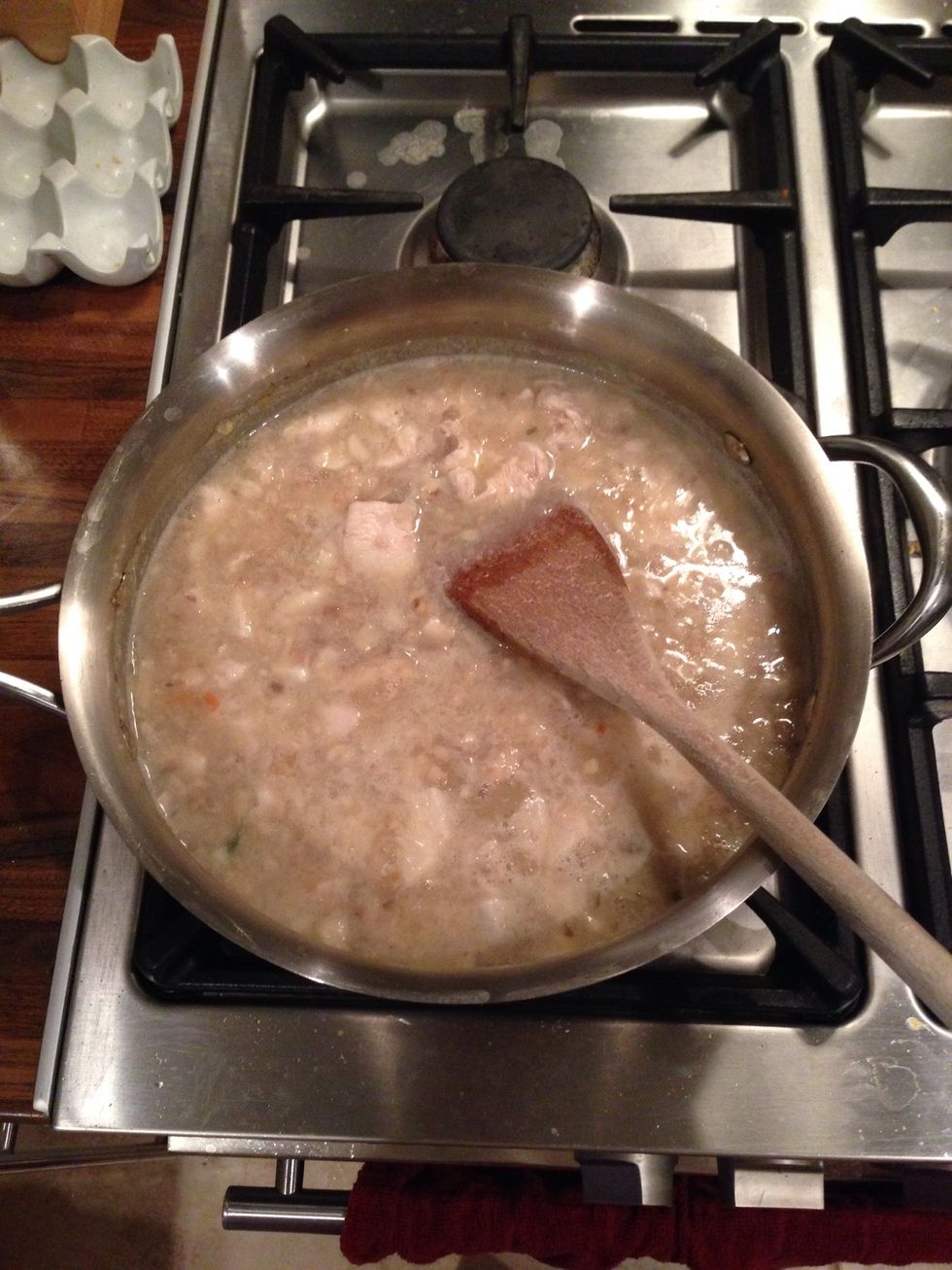 Add chicken, mushrooms and pour in half a bottle of white wine