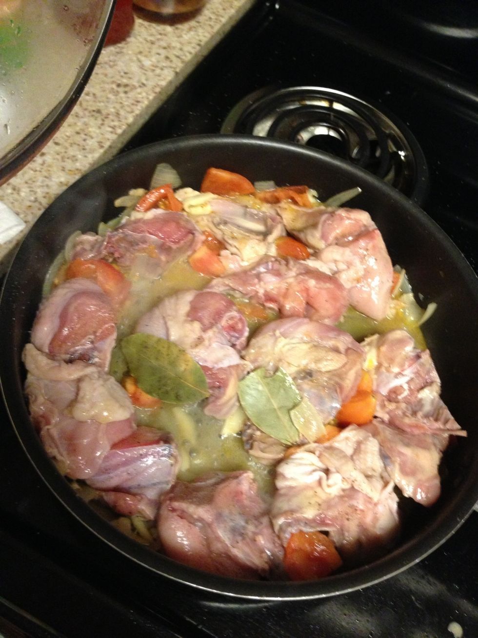 Add chicken, salt, laurel leaf wait until slightly cooked