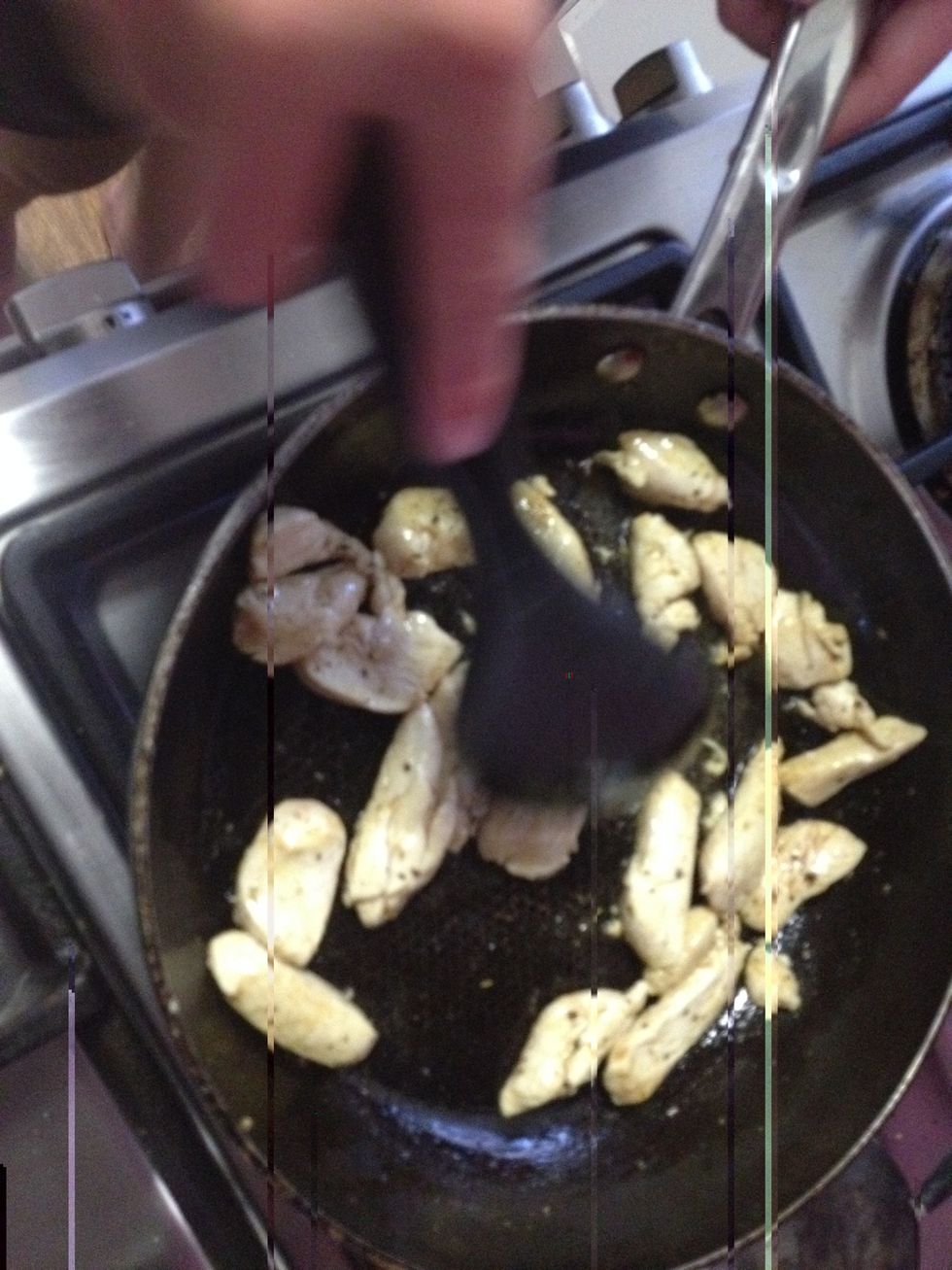 Add chicken to fry pan. Cook till chicken is white.