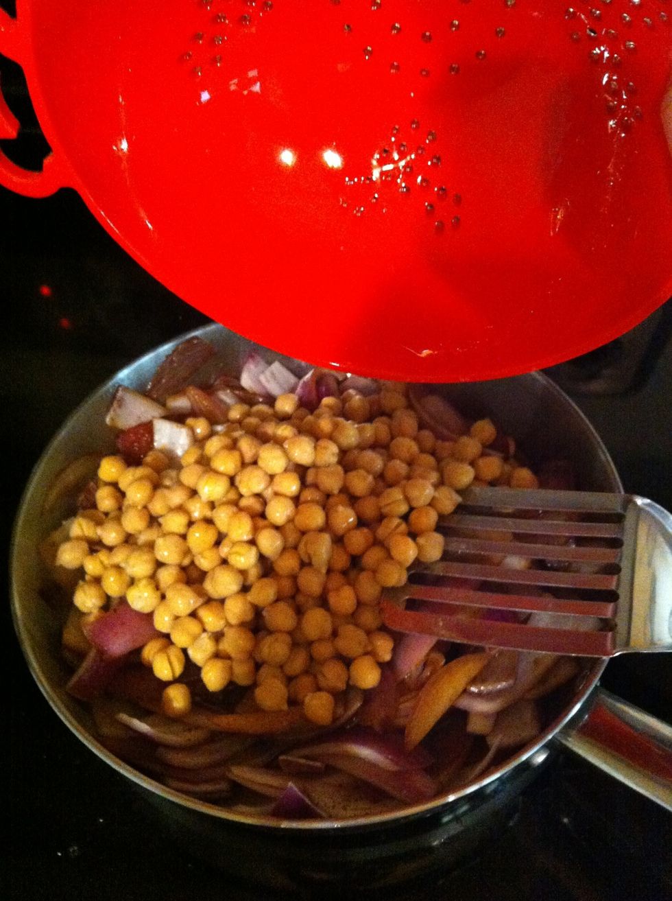 Add chickpeas and reduce heat to medium to reduce soy sauce to a thicker consistency
