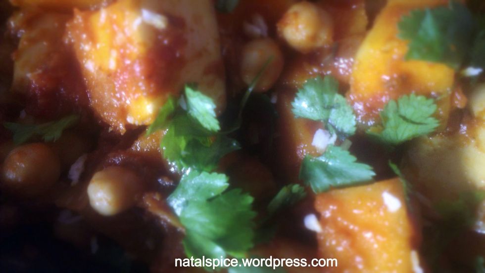 Add chickpeas, mix and cover. Add coriander and coconut to garnish.\ud83d\udd66