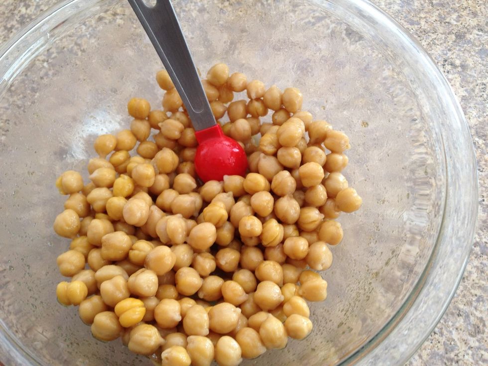 Add chickpeas to the bowl, and toss to coat.
