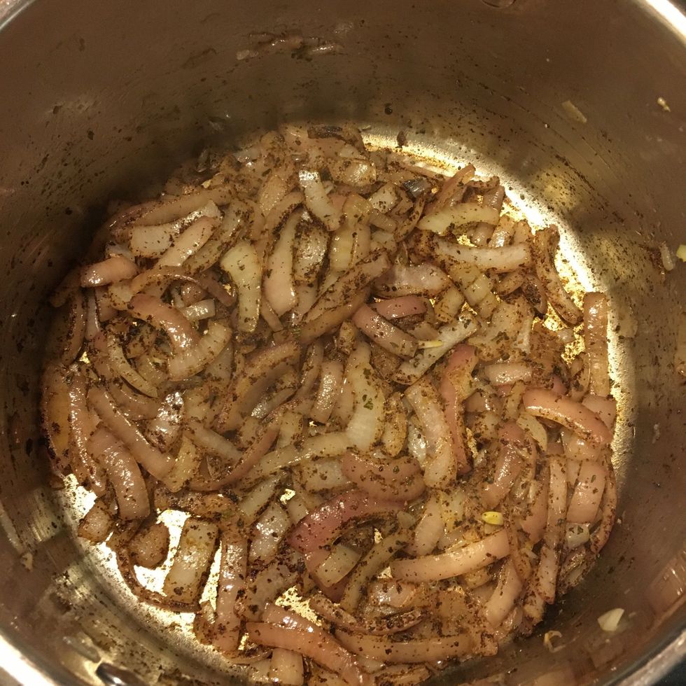 Add chili powder, cumin & oregano. Stir to coat.