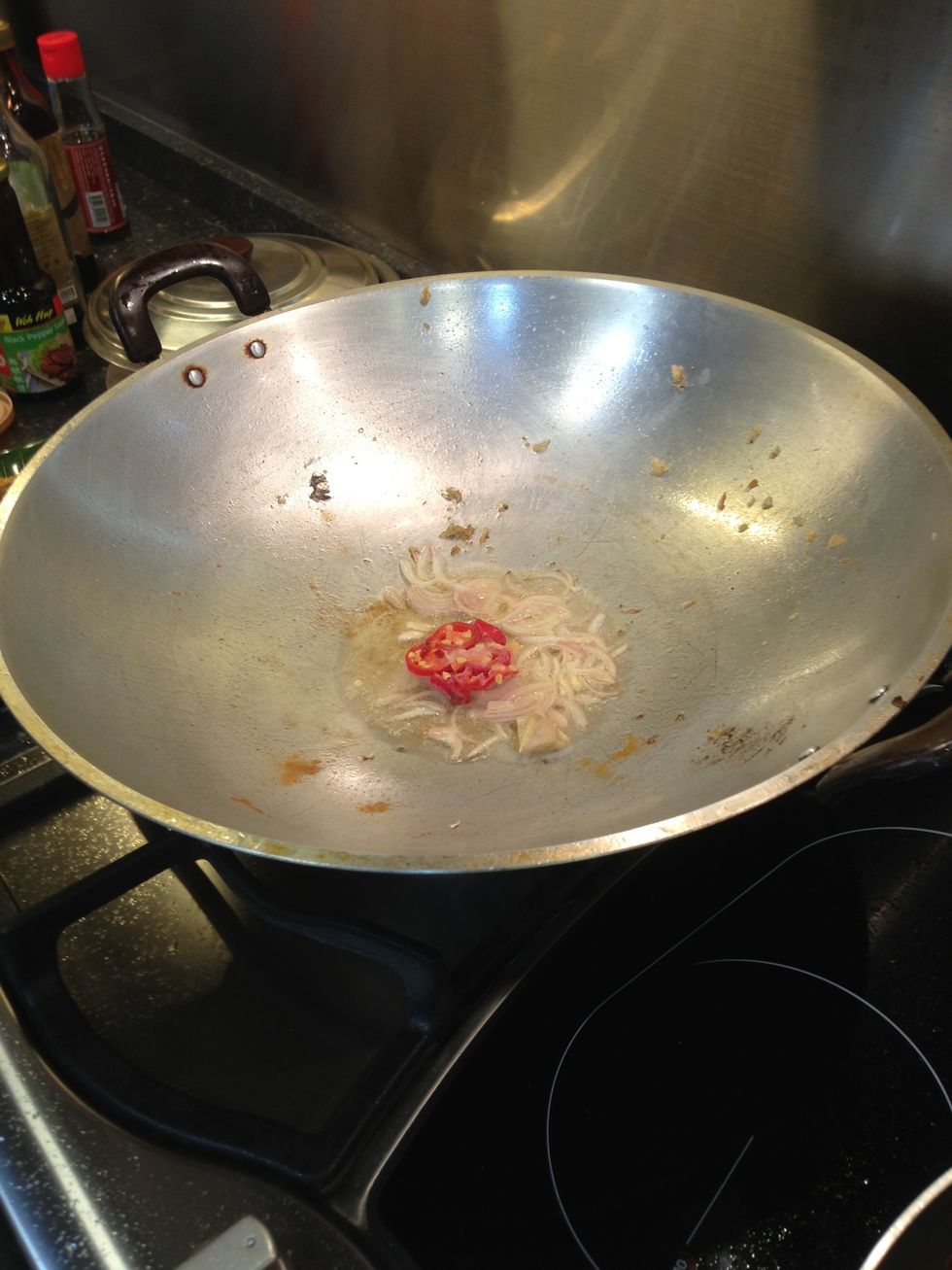 Add chilli and tiny ginger piece to fry