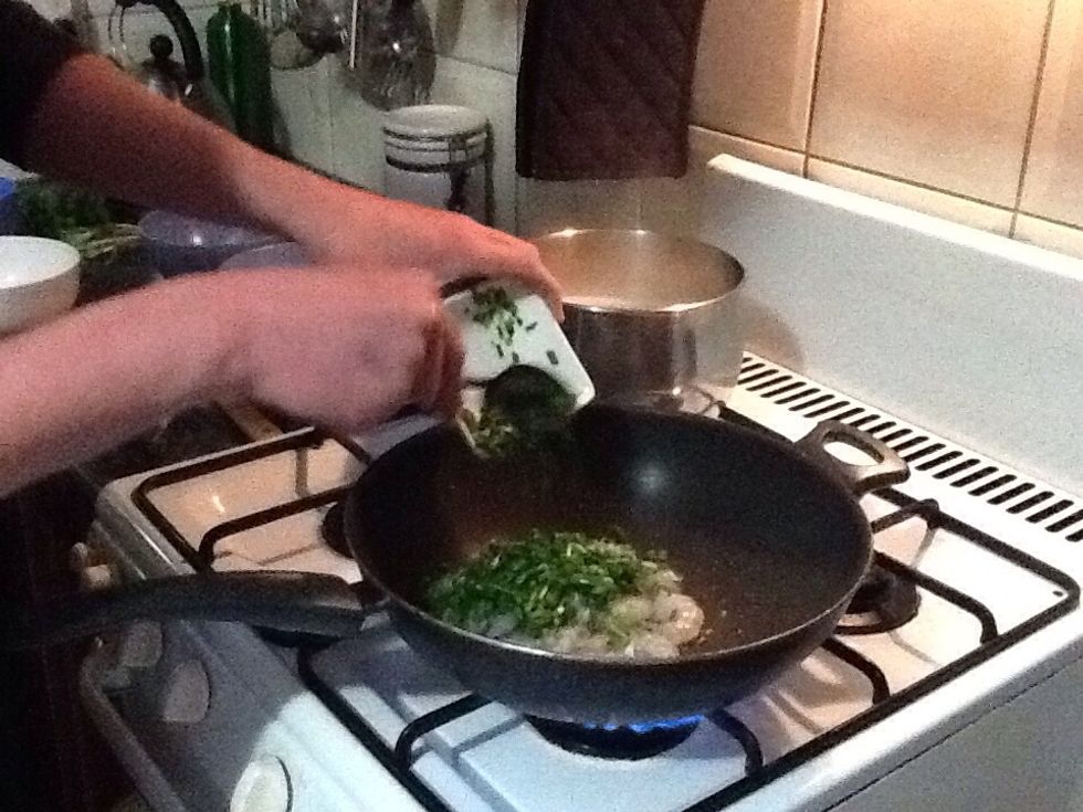 Add chives and stir-fry until chives wilt.