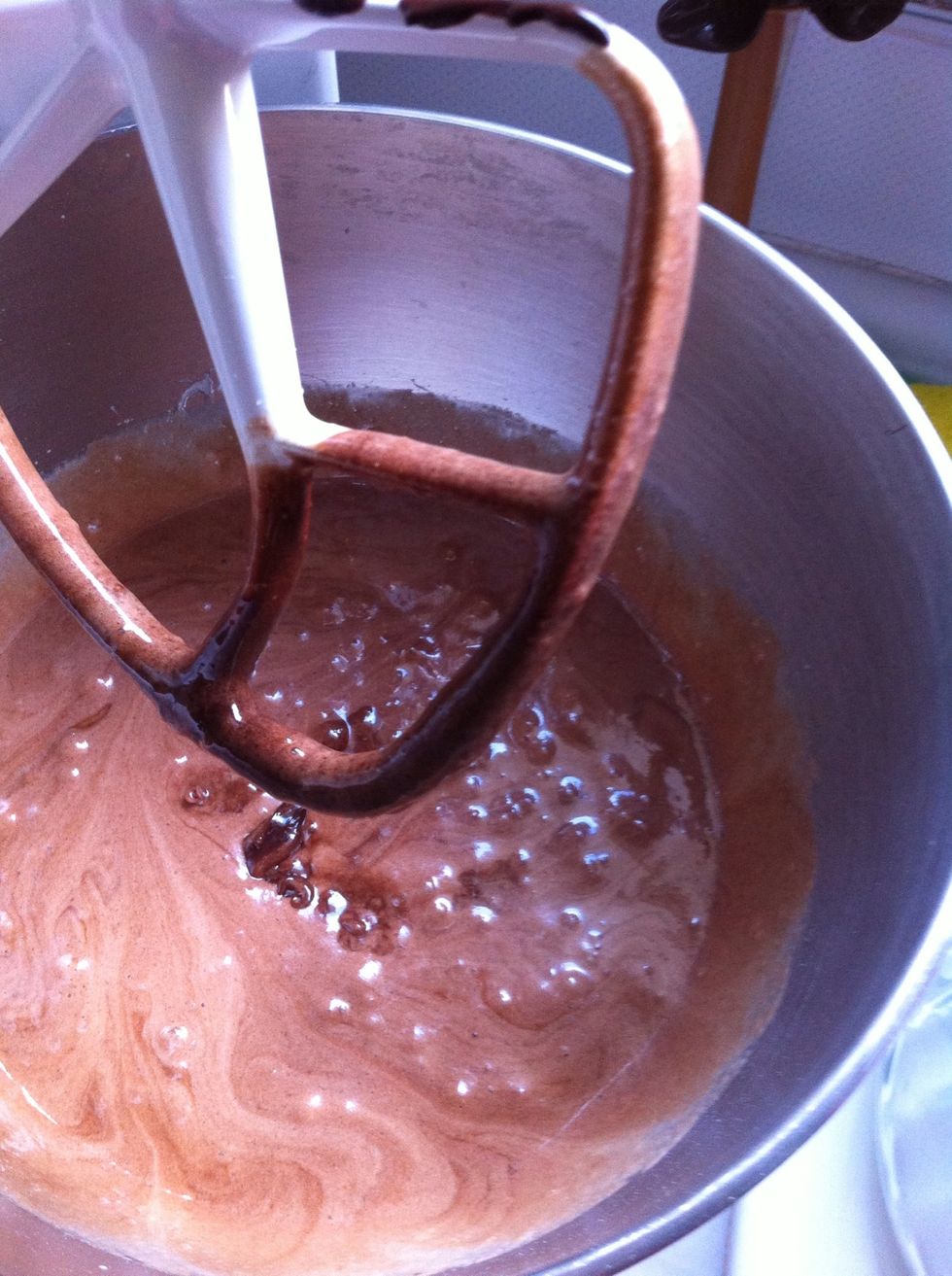 Add chocolate melted and beat in low speed for 30 seconds. Not more then that.