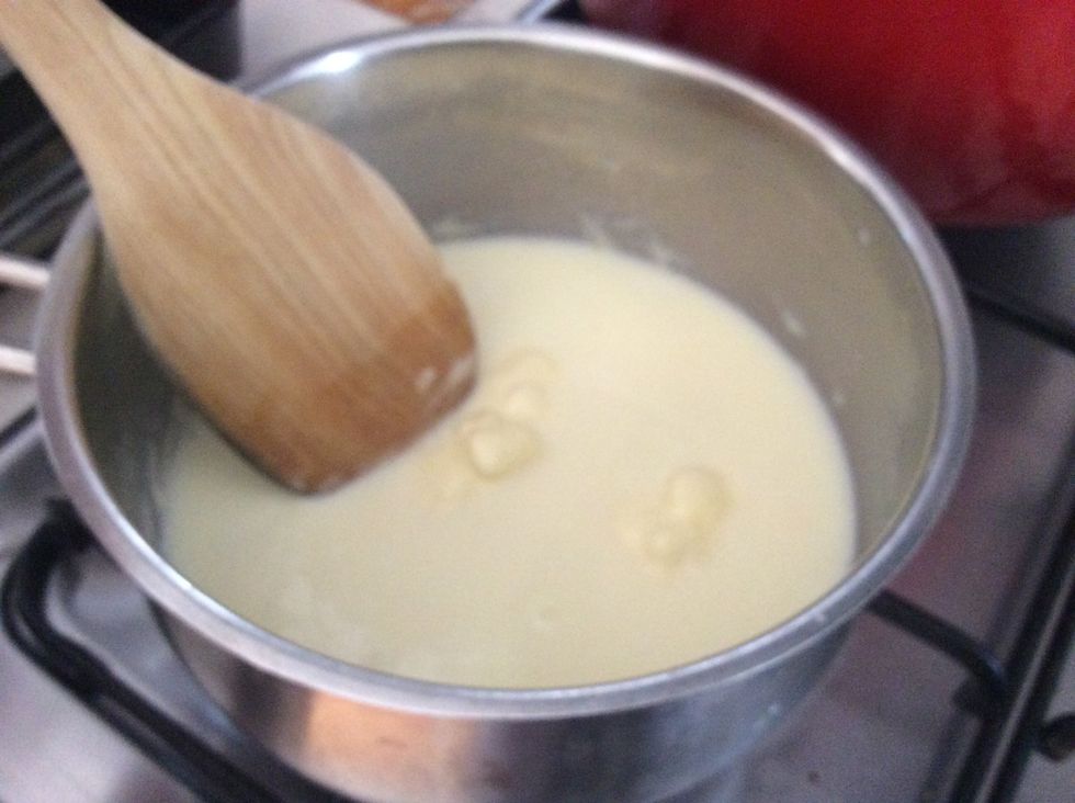 Add chocolate. Set aside for 3-4 minutes or until the chocolate melts.