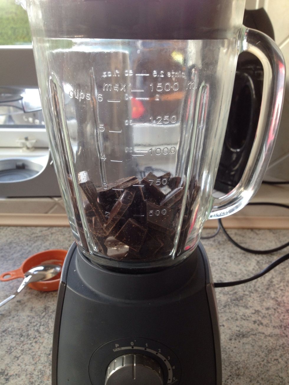Add chocolate to a blender...