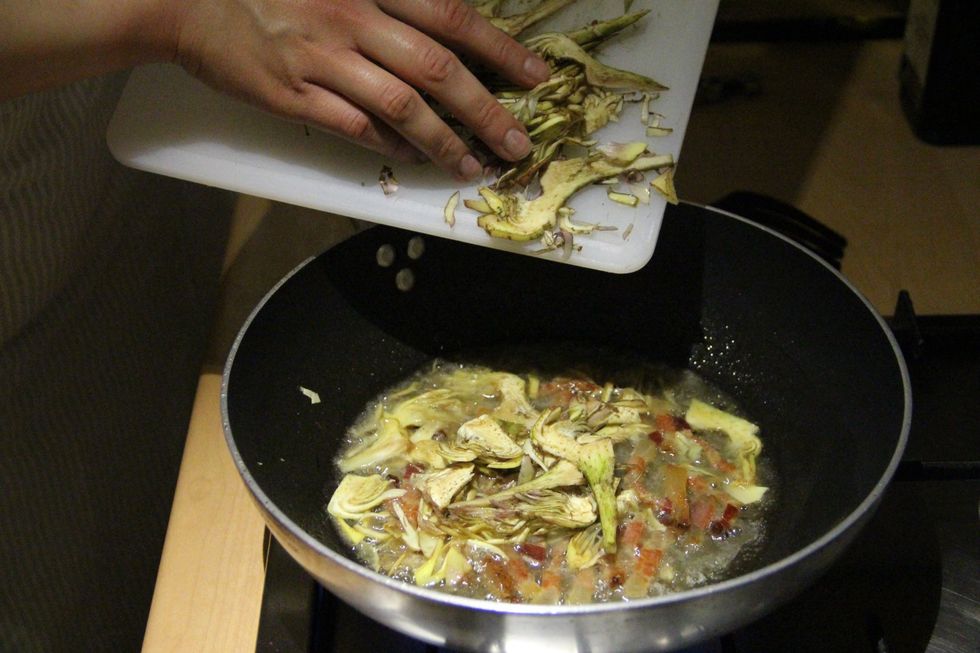 Add chopped artichokes