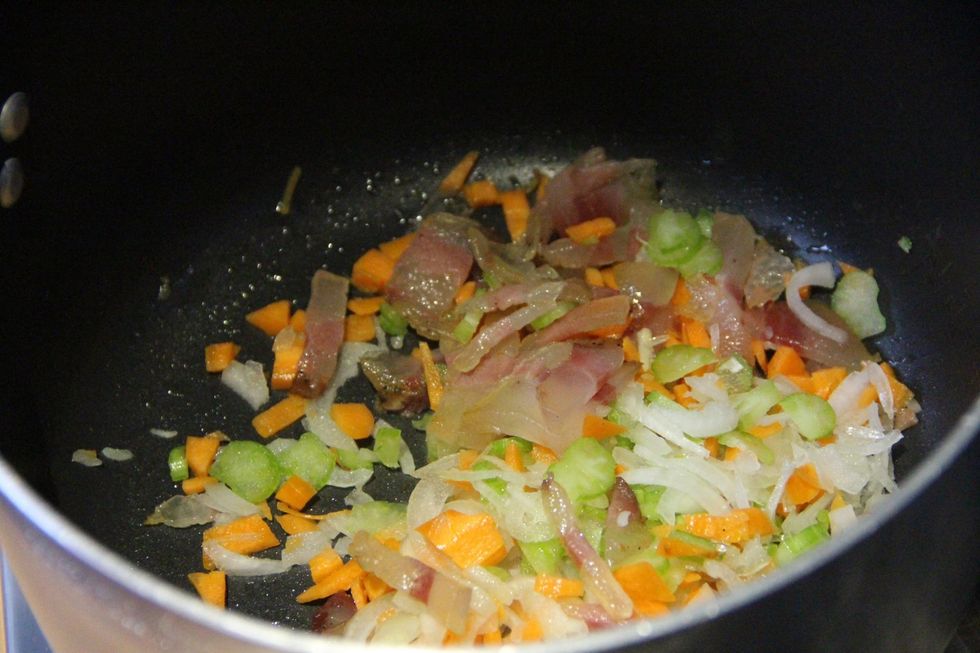Add chopped celery, carrot and white onion for a few minutes