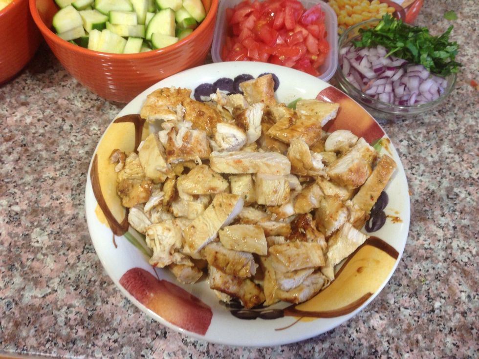 Add chopped chicken and garbanzo beans.